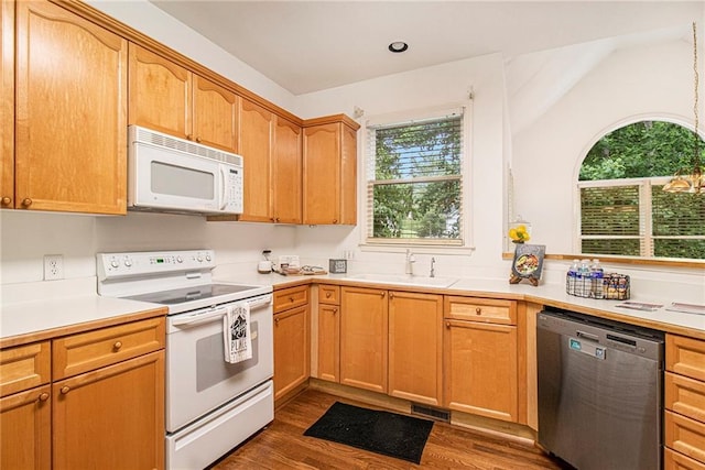200 Ridge Bluff Ln, Suwanee, GA 30024 - kitchen featuring white appliances, a sink, dark wood-style flooring, and light countertops