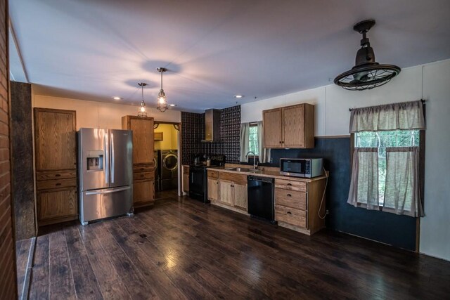 1530 Unity Church Cir, Maysville, GA 30558 - kitchen featuring black appliances, dark wood-style floors, washer / dryer, pendant lighting, and brown cabinetry