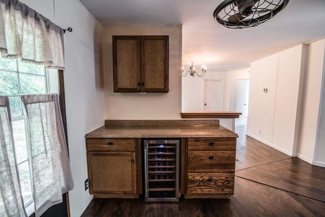 1530 Unity Church Cir, Maysville, GA 30558 - bar area featuring wine cooler, dark wood-style floors, and a chandelier