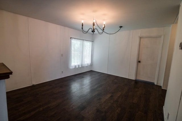 1530 Unity Church Cir, Maysville, GA 30558 - unfurnished dining area featuring a chandelier and dark wood finished floors