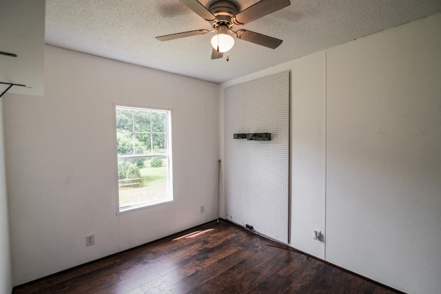 1530 Unity Church Cir, Maysville, GA 30558 - empty room with wood finished floors, ceiling fan, and a textured ceiling