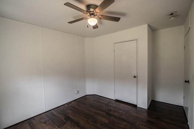 1530 Unity Church Cir, Maysville, GA 30558 - empty room featuring a ceiling fan and dark wood-type flooring