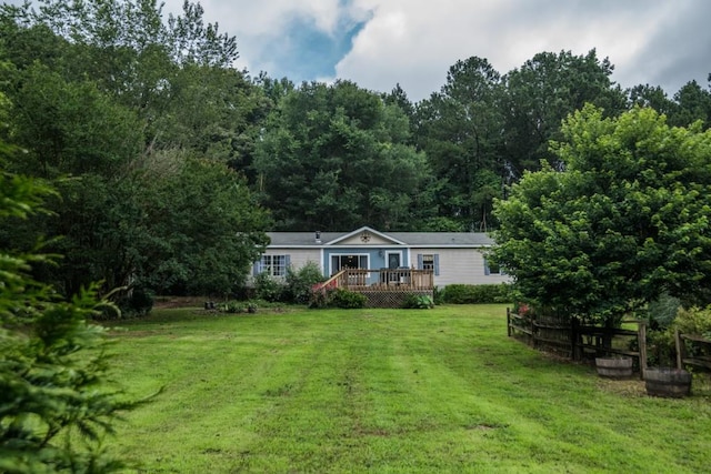 1530 Unity Church Cir, Maysville, GA 30558 - manufactured / mobile home with a wooden deck and a front yard