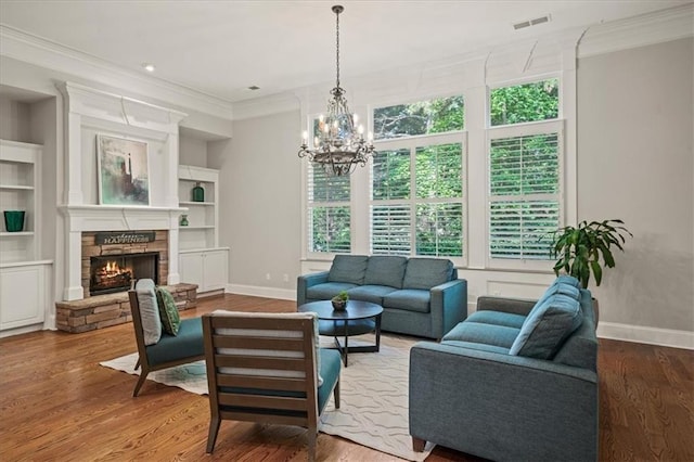 1323 Frey Lake Ct, Kennesaw, GA 30144 - living area featuring baseboards, healthy amount of natural light, crown molding, and a chandelier
