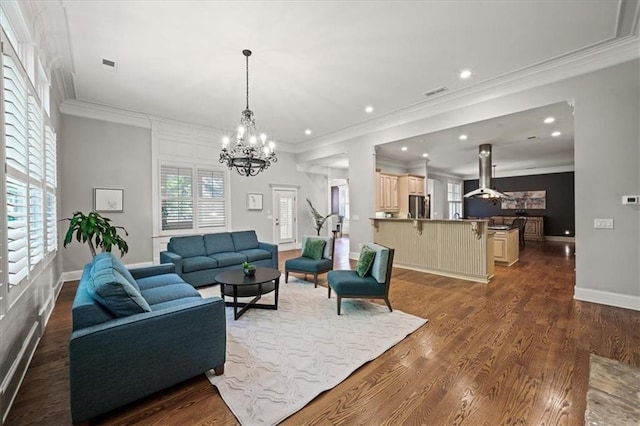 1323 Frey Lake Ct, Kennesaw, GA 30144 - living room featuring a chandelier, dark wood-style flooring, crown molding, recessed lighting, and baseboards