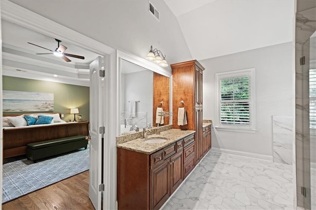 1323 Frey Lake Ct, Kennesaw, GA 30144 - ensuite bathroom featuring vanity, a ceiling fan, a stall shower, baseboards, and vaulted ceiling