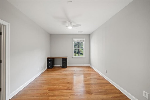 1323 Frey Lake Ct, Kennesaw, GA 30144 - spare room with a ceiling fan, light wood finished floors, an office area, and baseboards