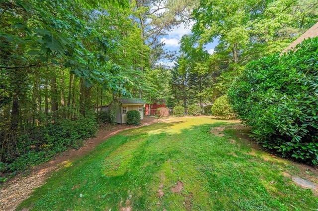 1323 Frey Lake Ct, Kennesaw, GA 30144 - view of green lawn featuring a wooded view