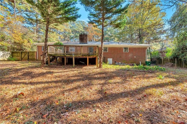 back of property with a wooden deck