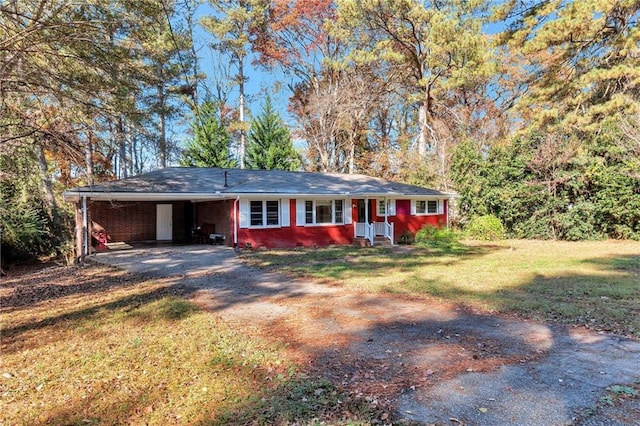 single story home with a carport and a front lawn