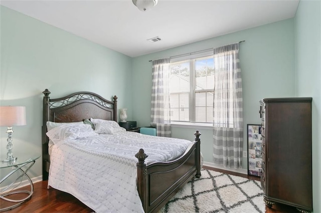 829 Castlebottom Dr, Lawrenceville, GA 30045 - bedroom with wood finished floors and baseboards