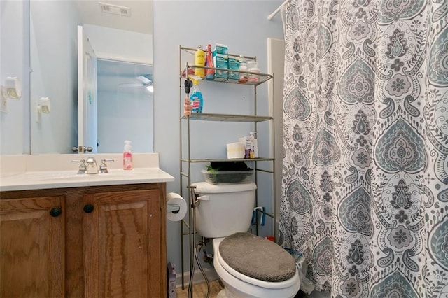 829 Castlebottom Dr, Lawrenceville, GA 30045 - bathroom featuring vanity, toilet, and curtained shower