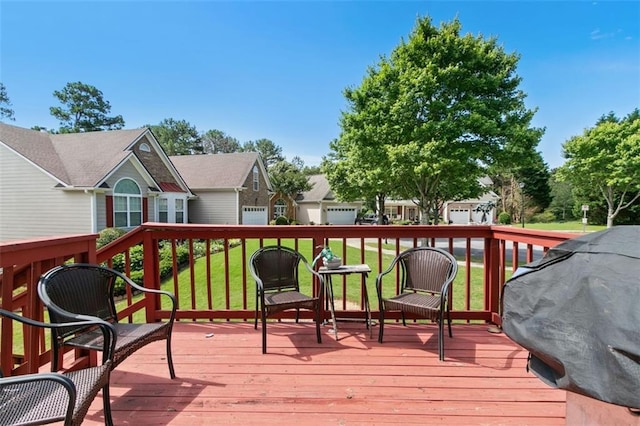 829 Castlebottom Dr, Lawrenceville, GA 30045 - wooden terrace with a grill, a yard, and a residential view