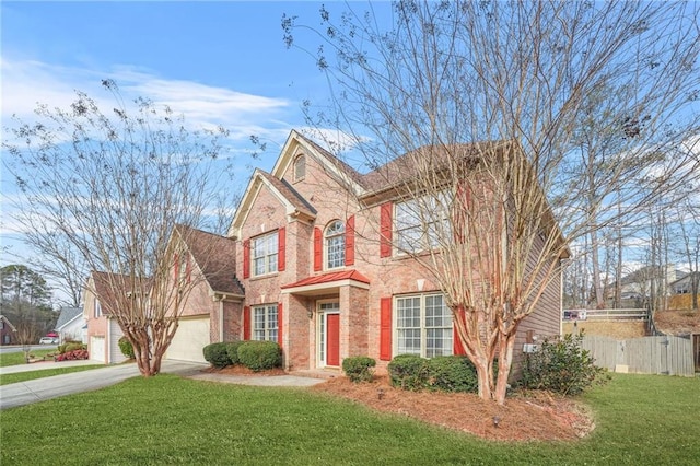 view of front of house featuring a garage and a front lawn