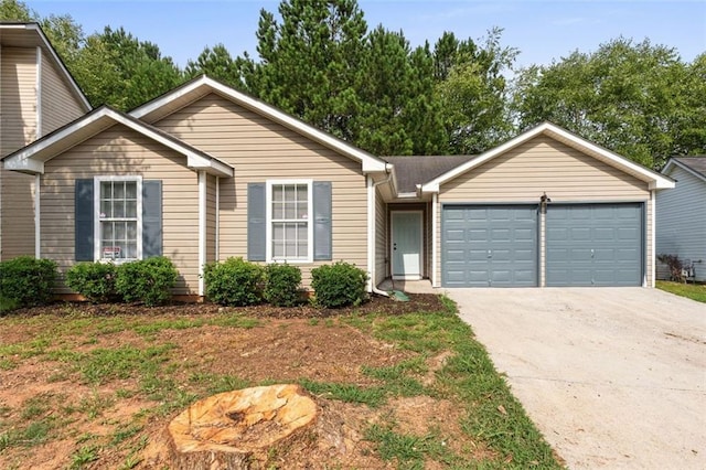 ranch-style home with a garage