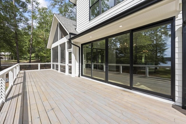 deck with a sunroom