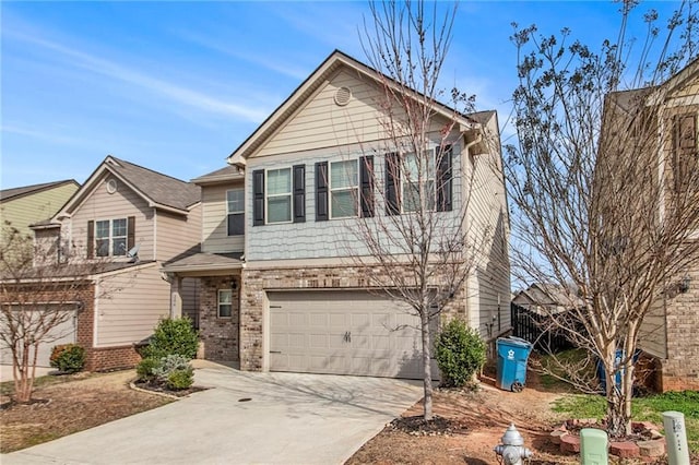 view of front of house with a garage, brick siding, and driveway