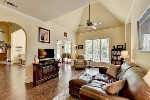 living room featuring ceiling fan, dark hardwood / wood-style flooring, and high vaulted ceiling