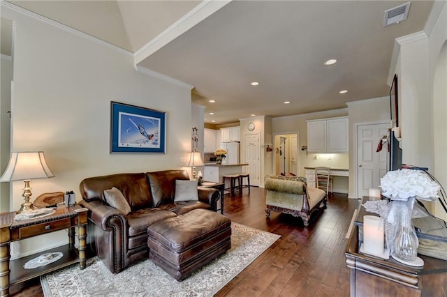 living room with lofted ceiling, dark hardwood / wood-style floors, and ornamental molding