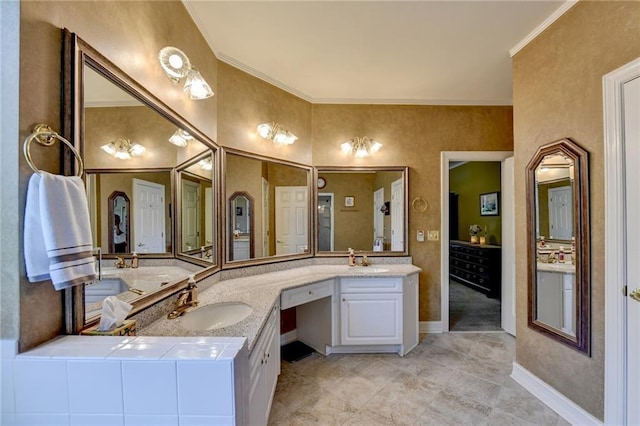 bathroom with vanity and crown molding