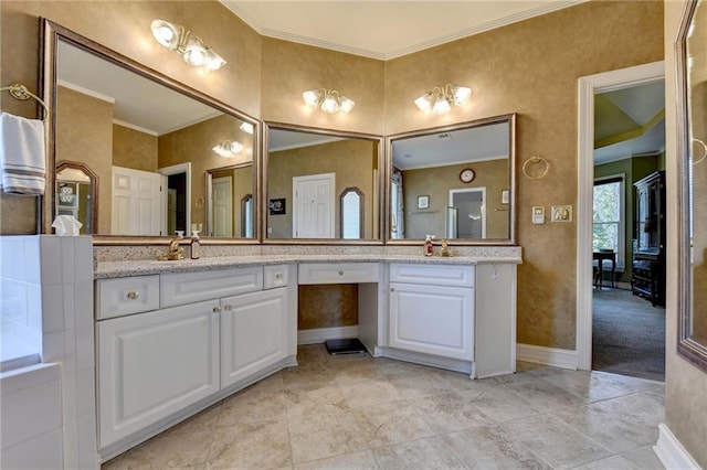 bathroom with vanity and crown molding