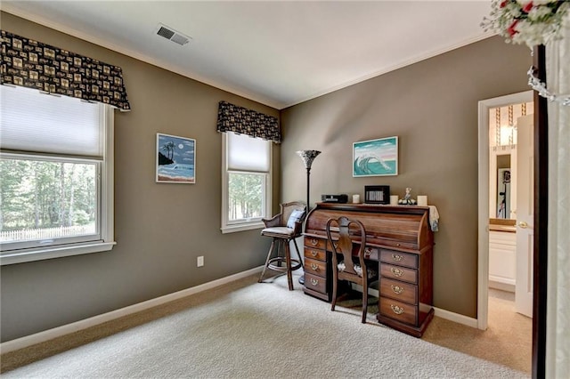 home office with light carpet and ornamental molding