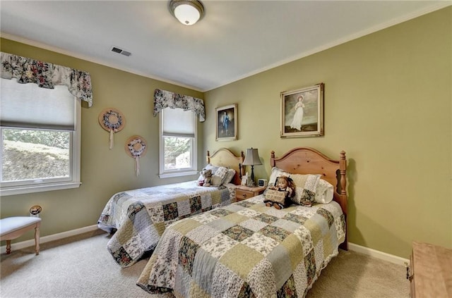 carpeted bedroom featuring ornamental molding