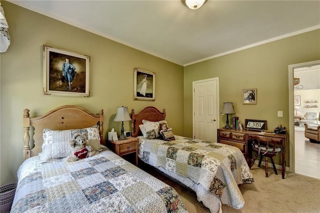 carpeted bedroom with ornamental molding