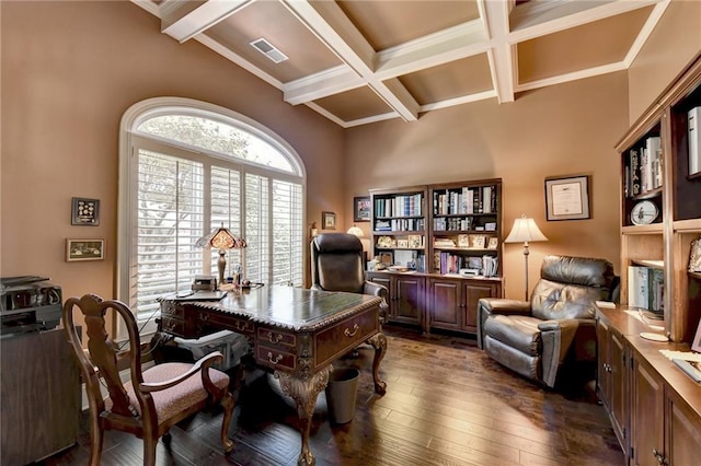 office area featuring beamed ceiling, crown molding, and dark wood-type flooring