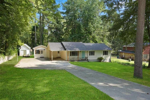 single story home with a front lawn and a carport