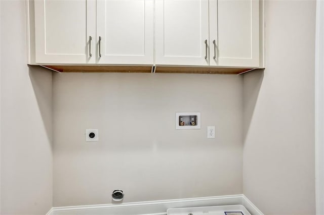 laundry room featuring baseboards, hookup for a washing machine, cabinet space, and hookup for an electric dryer