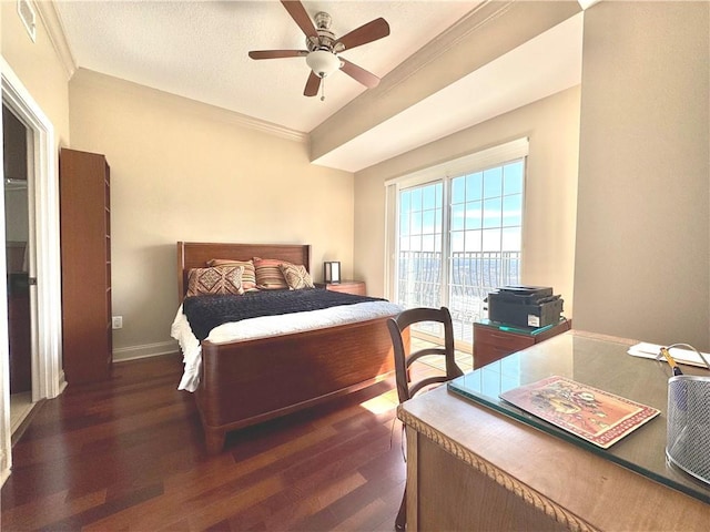 bedroom with dark wood-style floors, ornamental molding, a ceiling fan, a textured ceiling, and baseboards