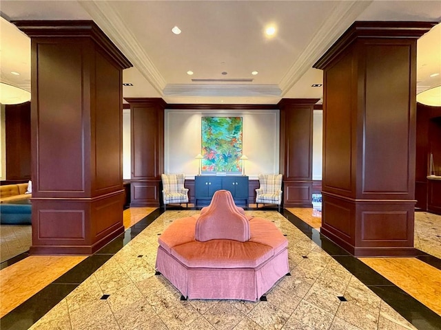 cinema room with ornate columns, recessed lighting, granite finish floor, and a decorative wall