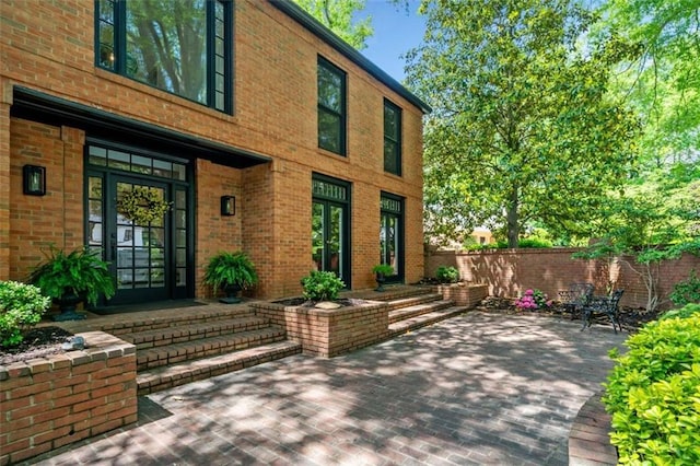 view of patio / terrace featuring fence