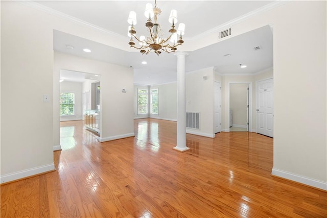 50 Biscayne Dr NW Unit 2113, Atlanta, GA 30309 - empty room with light wood-style flooring, ornamental molding, decorative columns, a chandelier, and recessed lighting