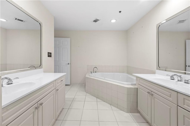 50 Biscayne Dr NW Unit 2113, Atlanta, GA 30309 - bathroom featuring two vanities, a bath, and tile patterned floors