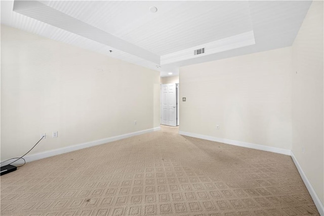 50 Biscayne Dr NW Unit 2113, Atlanta, GA 30309 - spare room featuring light colored carpet and a tray ceiling