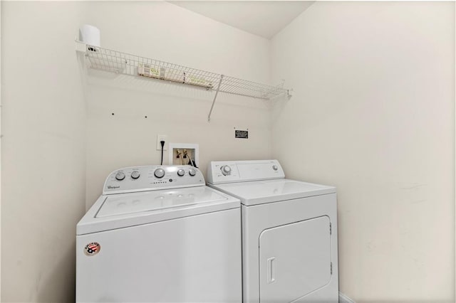 50 Biscayne Dr NW Unit 2113, Atlanta, GA 30309 - washroom with washer and clothes dryer