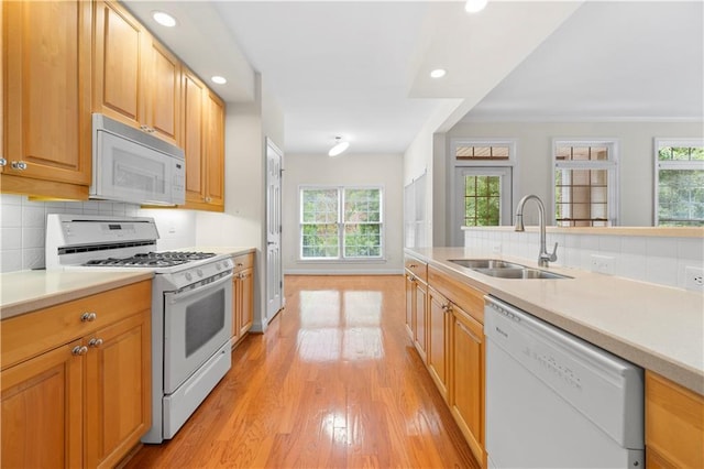 50 Biscayne Dr NW Unit 2113, Atlanta, GA 30309 - kitchen featuring white appliances, light wood-style floors, recessed lighting, backsplash, and light countertops