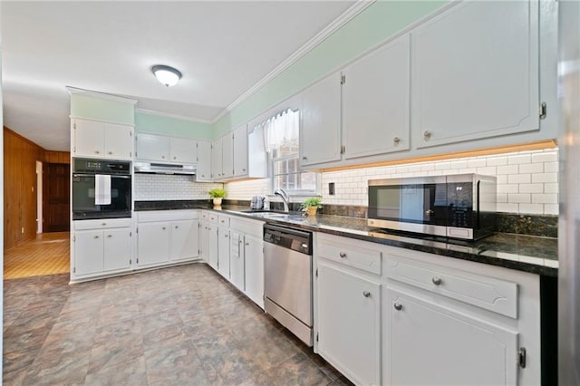 kitchen featuring stainless steel appliances, crown molding, sink, white cabinetry, and backsplash