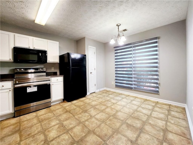 kitchen featuring dark countertops, white cabinetry, and black appliances