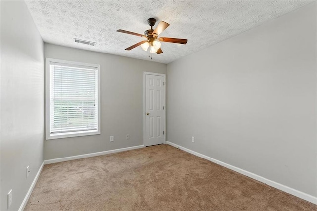 150 Crestworth Xing, Powder Springs, GA 30127 - carpeted spare room featuring a ceiling fan and a textured ceiling