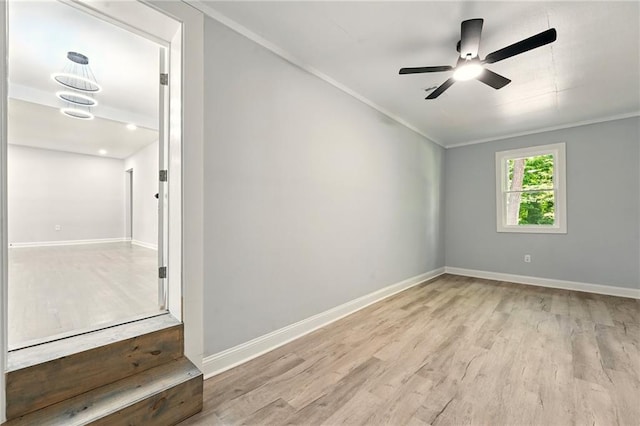 163 Oakcliff Ct, South Fulton, GA 30331 - empty room featuring wood finished floors, a ceiling fan, baseboards, and crown molding