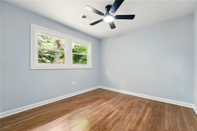 163 Oakcliff Ct, South Fulton, GA 30331 - spare room featuring baseboards, wood finished floors, and a ceiling fan