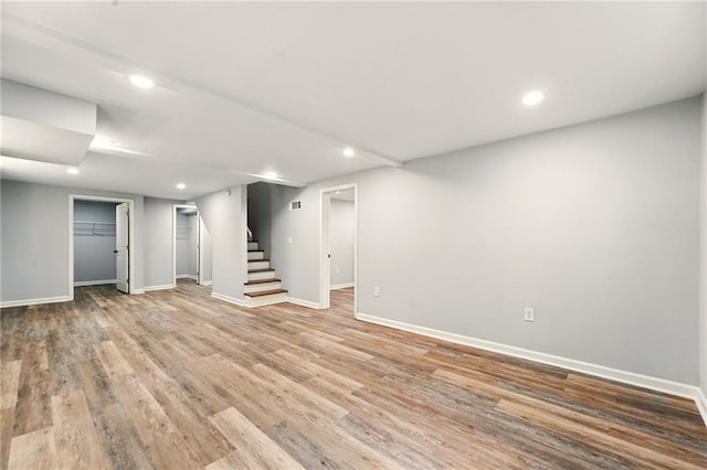 163 Oakcliff Ct, South Fulton, GA 30331 - finished below grade area with baseboards, stairs, wood finished floors, and recessed lighting