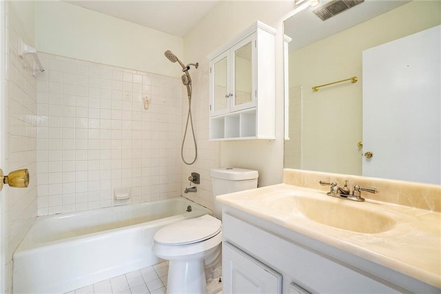 full bath with toilet, vanity, visible vents, shower / bathing tub combination, and tile patterned floors