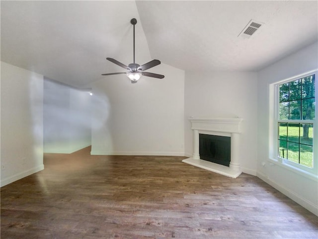 unfurnished living room featuring hardwood / wood-style flooring, lofted ceiling, and ceiling fan