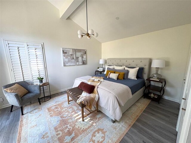 bedroom featuring wood finished floors, beam ceiling, baseboards, high vaulted ceiling, and a chandelier