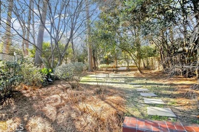 view of yard with fence
