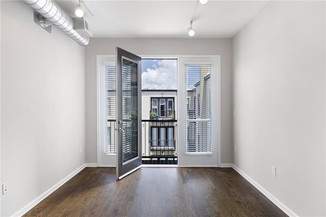 5300 Peachtree Rd Unit 3207, Chamblee, GA 30341 - unfurnished room featuring wood finished floors and track lighting